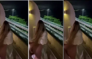 Influencer loira, cheia de curvas, se divertindo no terraço do prédio onde vive em Florianópolis
