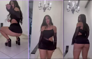 Cata Gonzalez toda linda de saia preta se divertindo na dança