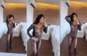 Ana Barreto exibindo sua bucetinha usando uma roupa transparente
