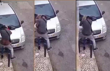 Loira safada dando uns amassos com um negão no meio da rua