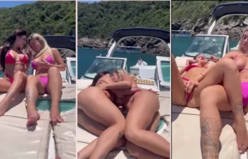 Debora Peixoto e Manuela Luisa estão se agarrando na lancha